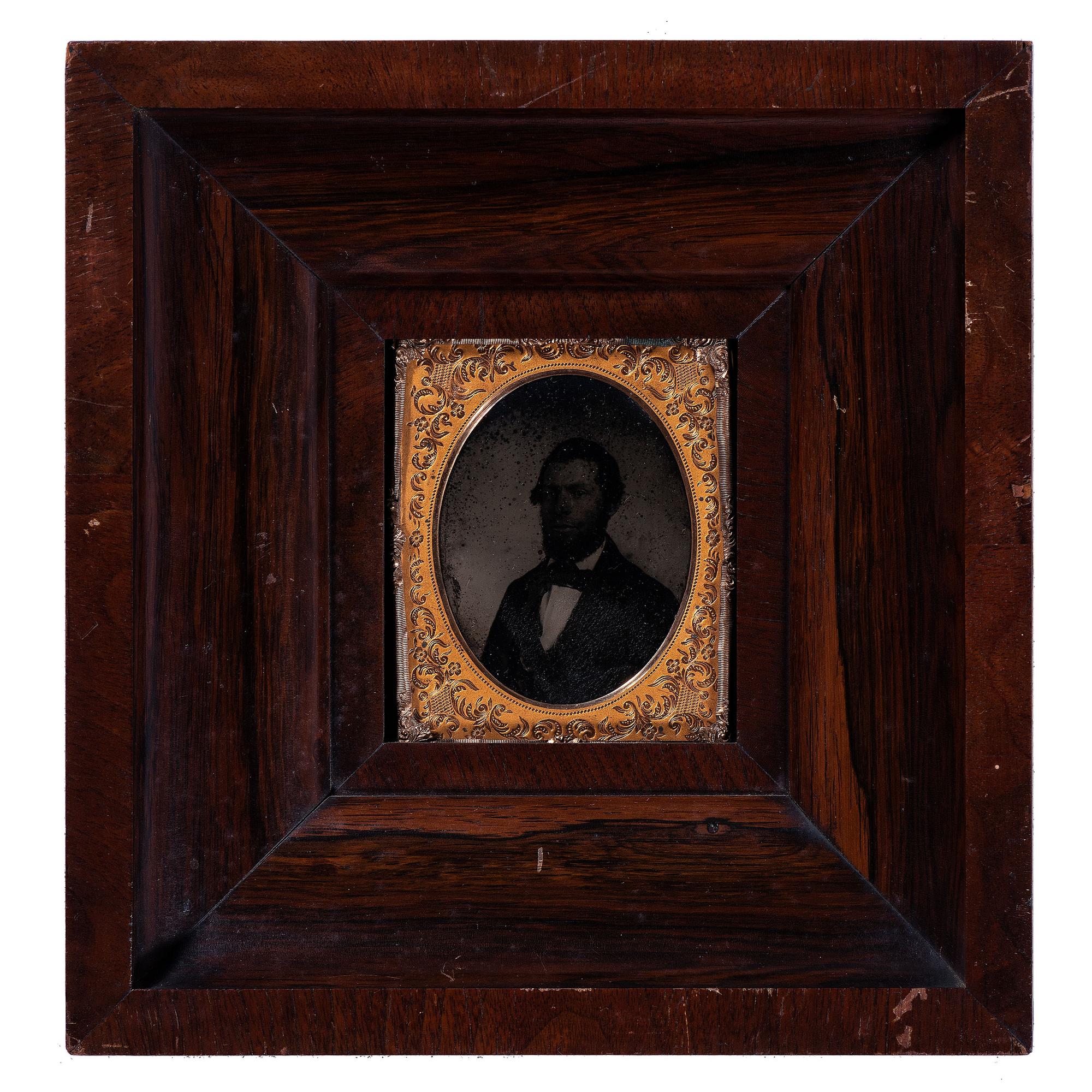 [EARLY PHOTOGRAPHY - PORTRAITURE]. A group of 11 framed portraits featuring male and female subjects highlighted by full plate tintype by Jacobs of New Orleans, including: