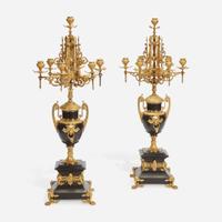 A Pair of Napoleon III Gilt-Bronze and Black Marble Seven-Light Candelabra Third quarter 19th century