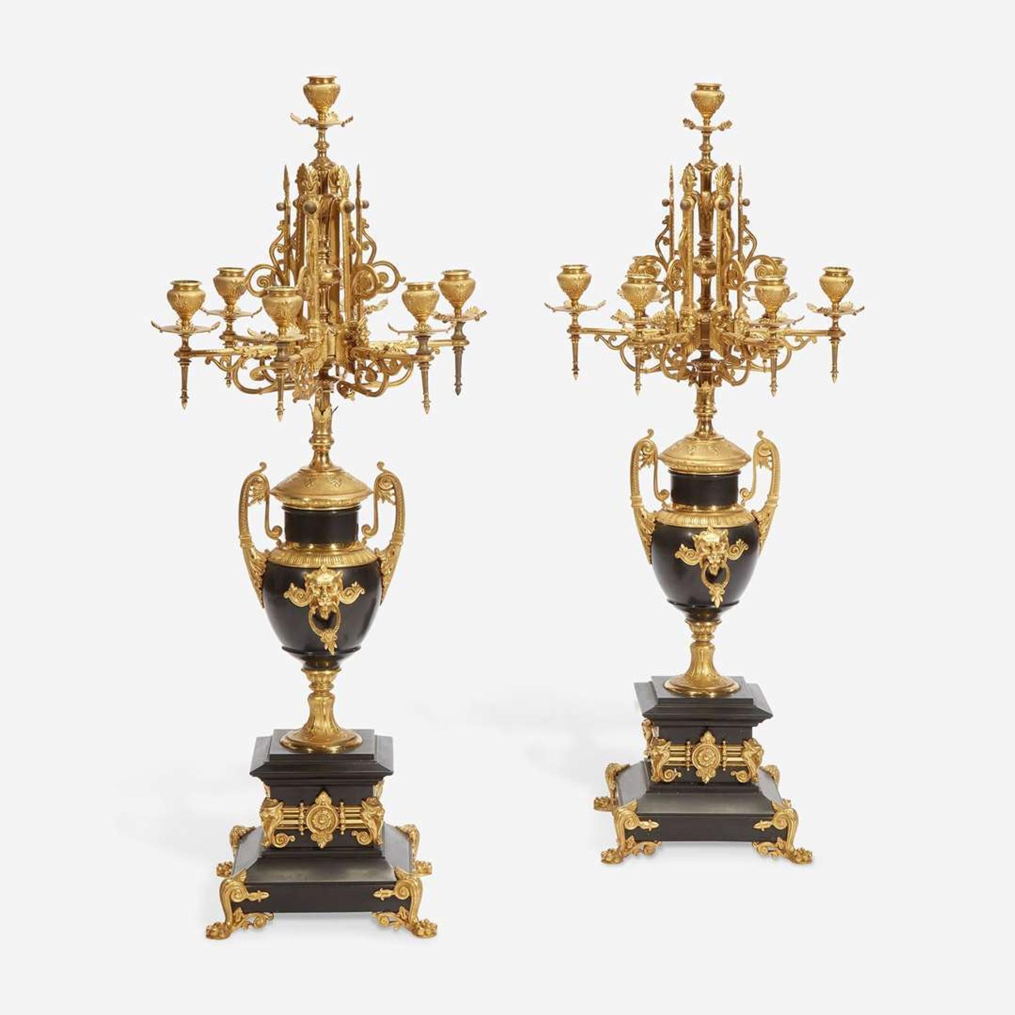 A Pair of Napoleon III Gilt-Bronze and Black Marble Seven-Light Candelabra Third quarter 19th century