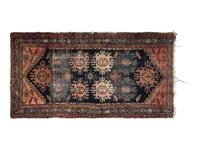 A Persian Wool Rug