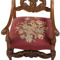 A Renaissance Revival Carved Hall Chair in Walnut with Shell-Form Crest and Pierced Back Splat