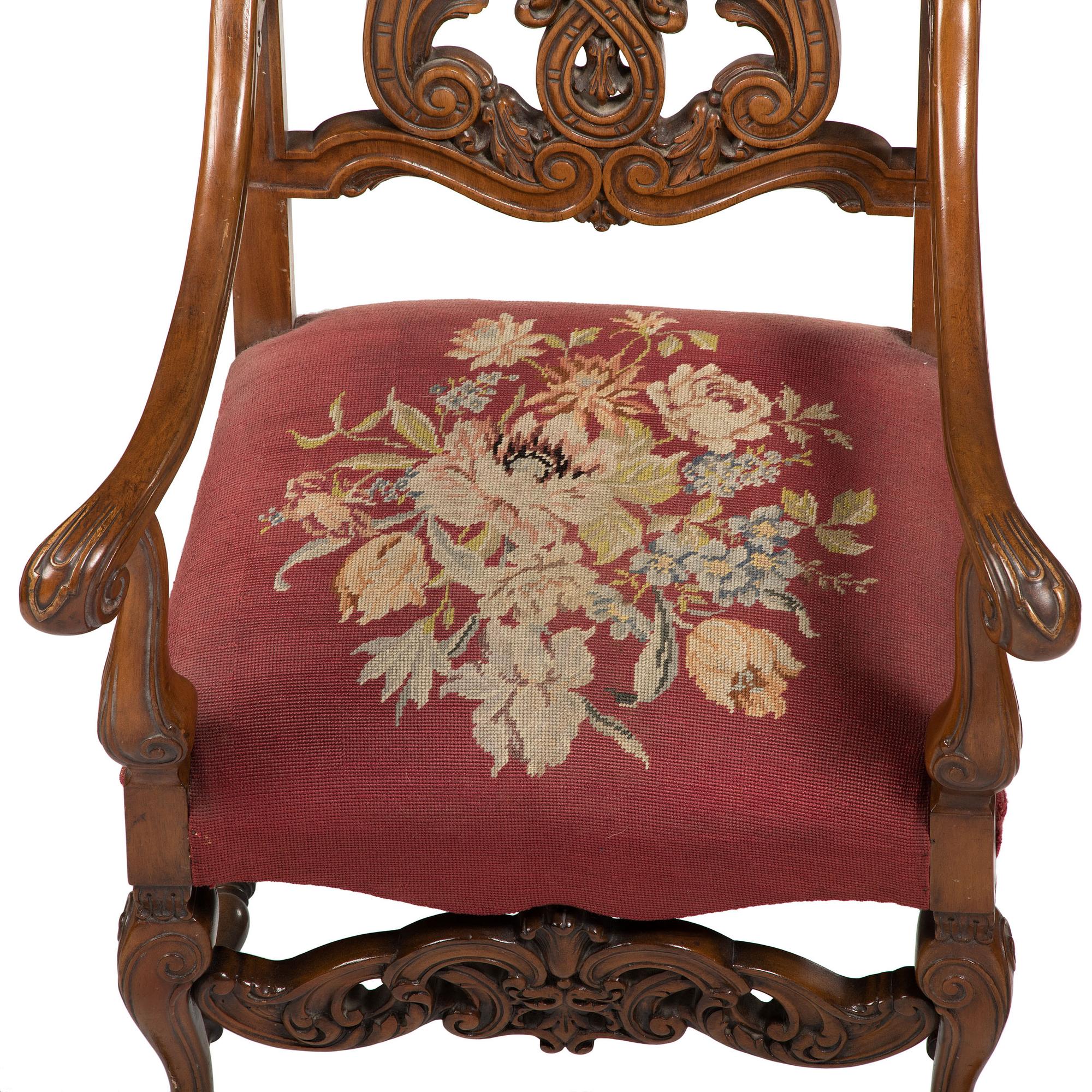 A Renaissance Revival Carved Hall Chair in Walnut with Shell-Form Crest and Pierced Back Splat