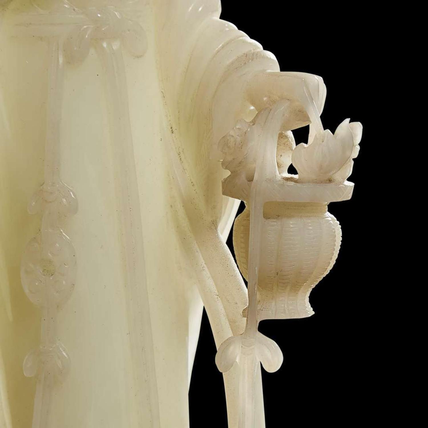 A Chinese carved white jade figure of a meiren 白玉雕美人 19th/early 20th century ????????