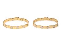 PAIR OF YELLOW GOLD NAIL HEAD MOTIF BRACELETS