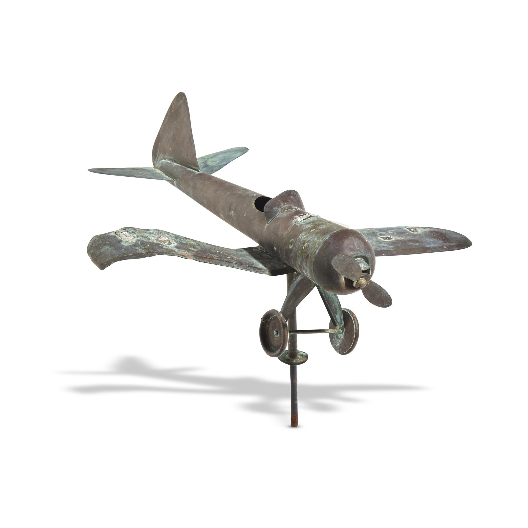 A Patinated Copper Airplane Weathervane