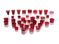 A Collection of Thirty-Six American Pressed Glass Wine Stems and Handled Mugs