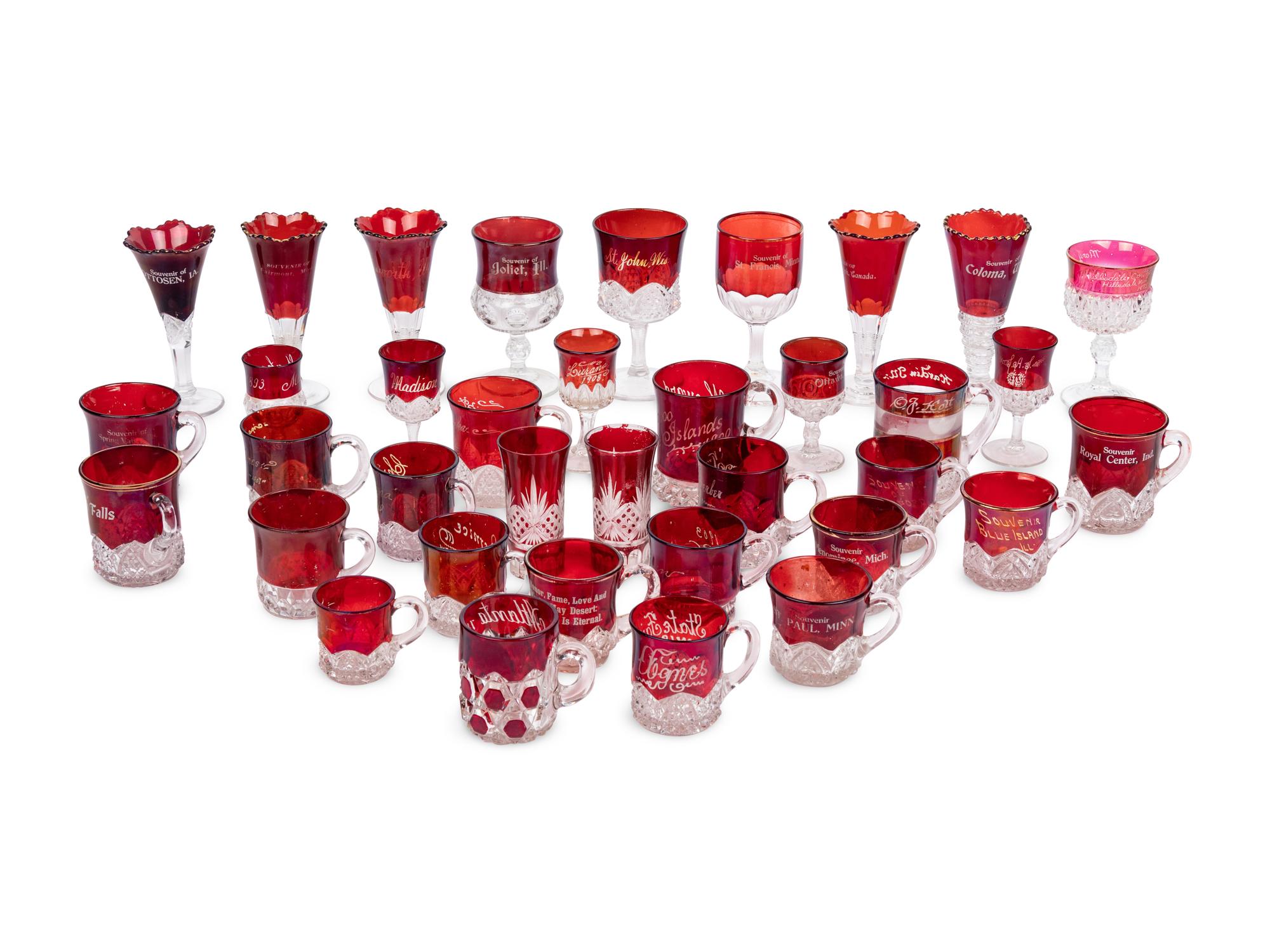 A Collection of Thirty-Six American Pressed Glass Wine Stems and Handled Mugs