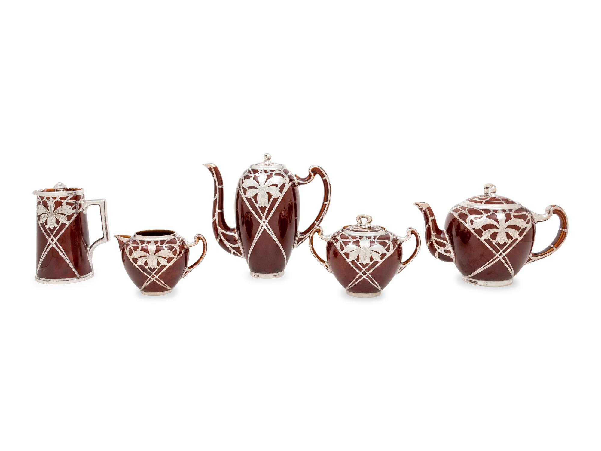 An American Silver Overaly Porcelain Five-Piece Tea and Coffee Service