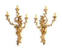 A Pair of Louis XV Style Giltwood Three-Light Sconces