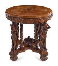 An Italian Carved Walnut and Marquetry Table