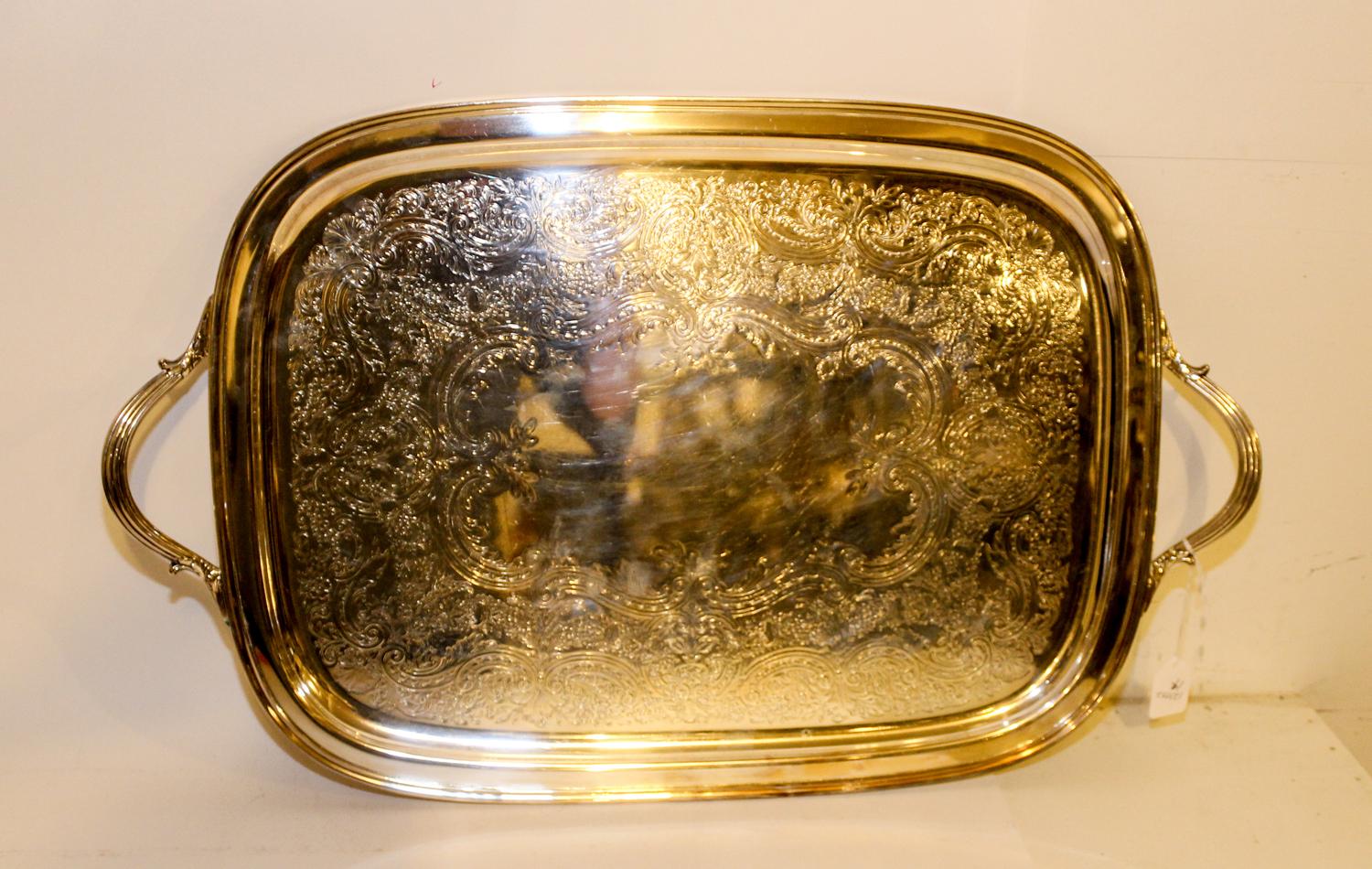 A Silver-Plate Tray. Length over handles 26 1/4 inches.