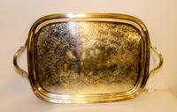 A Silver-Plate Tray. Length over handles 26 1/4 inches.