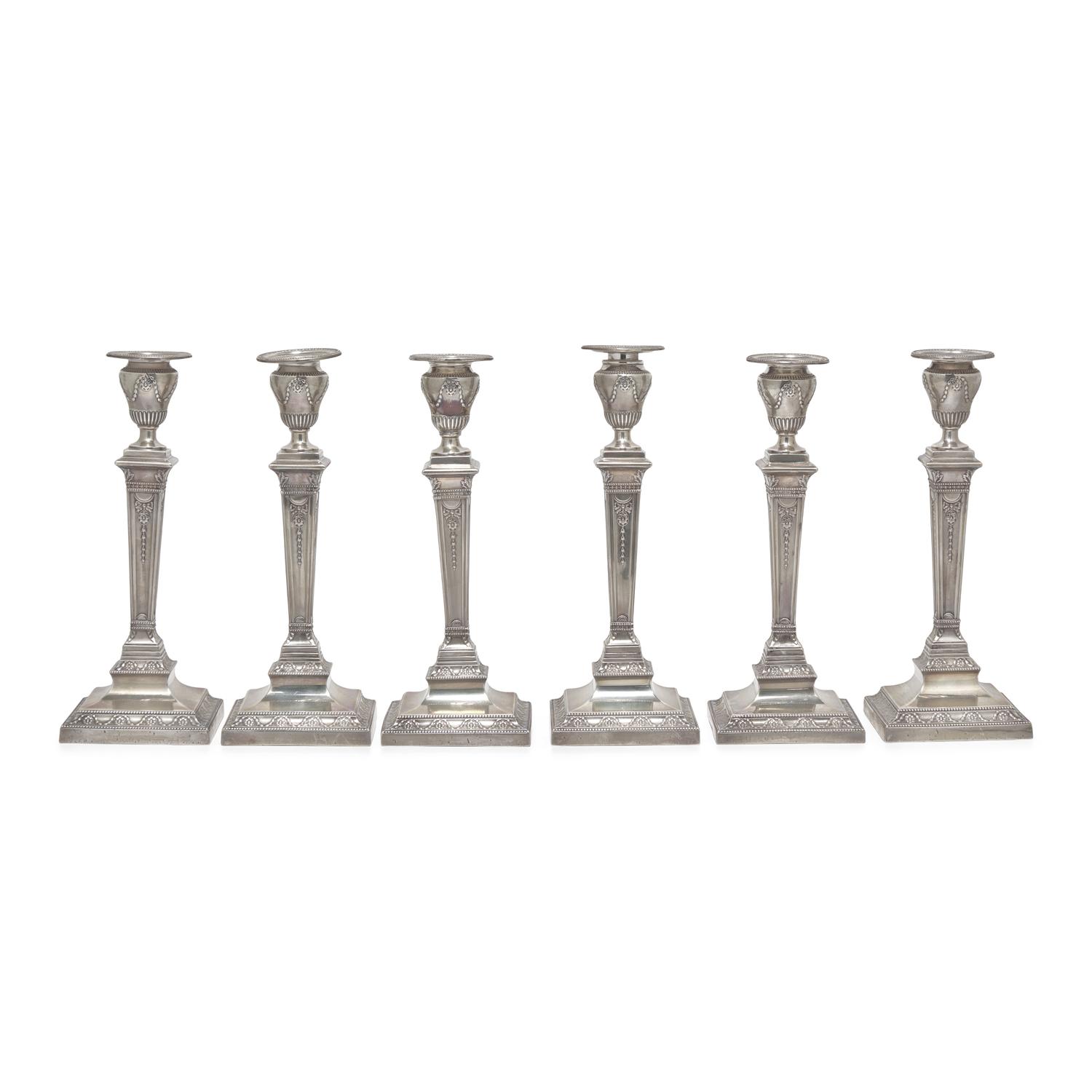 A Set of Six Neoclassical Style Weighted Sterling Silver Candlesticks