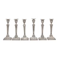 A Set of Six Neoclassical Style Weighted Sterling Silver Candlesticks