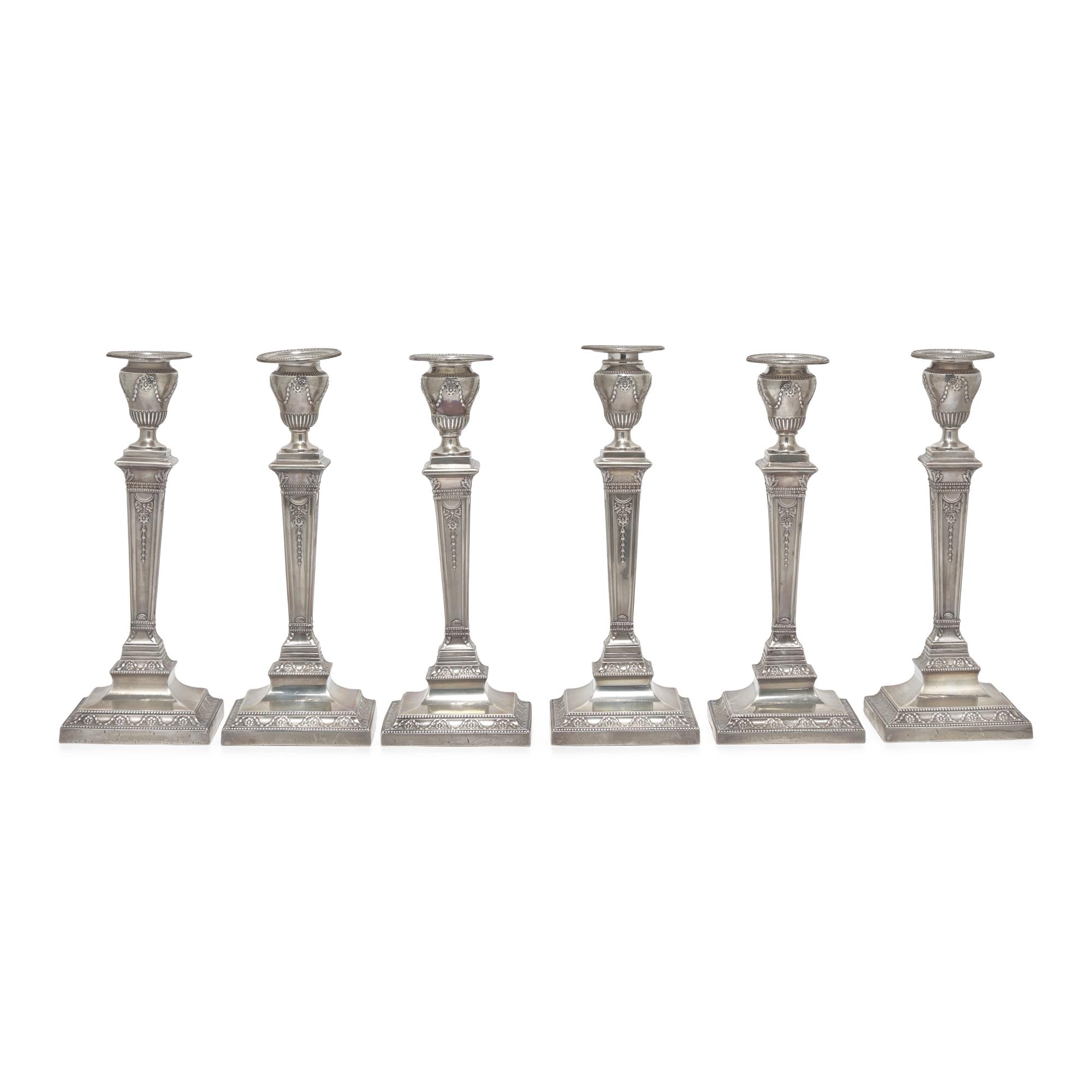 A Set of Six Neoclassical Style Weighted Sterling Silver Candlesticks