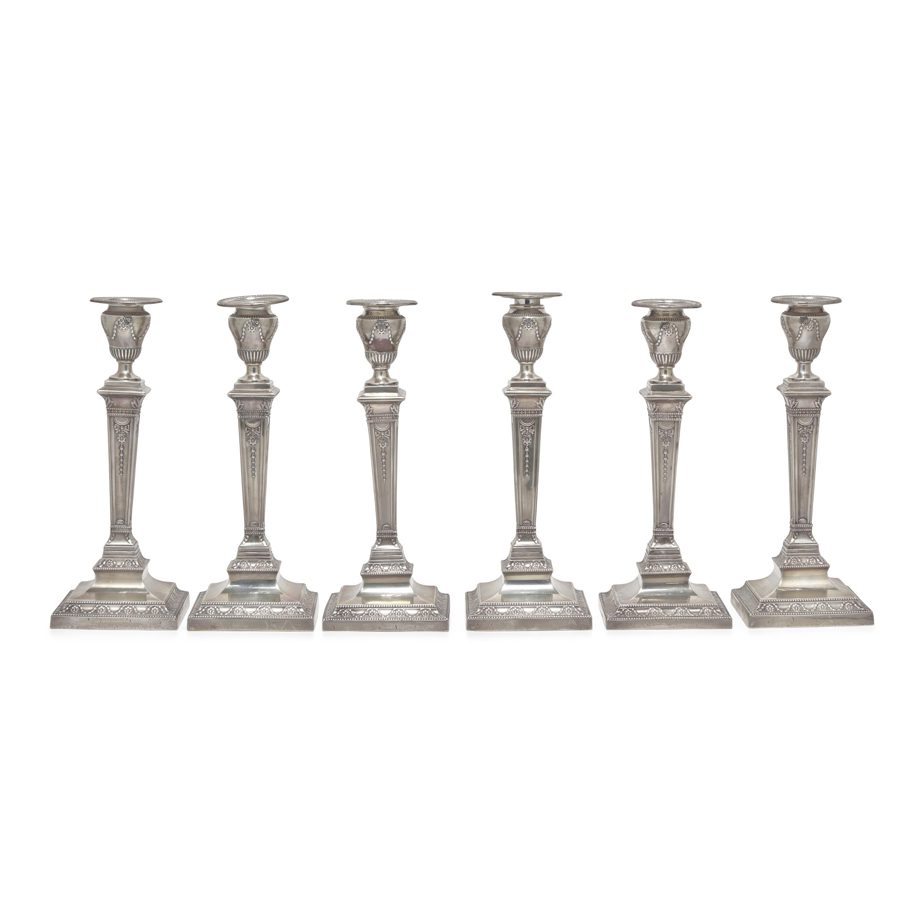 A Set of Six Neoclassical Style Weighted Sterling Silver Candlesticks