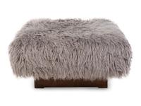 An American Sheepskin-Upholstered Ottoman — 20TH CENTURY