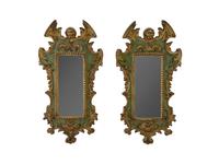 A Pair of Italian Neoclassical Style Parcel-Gilt and Painted Mirrors