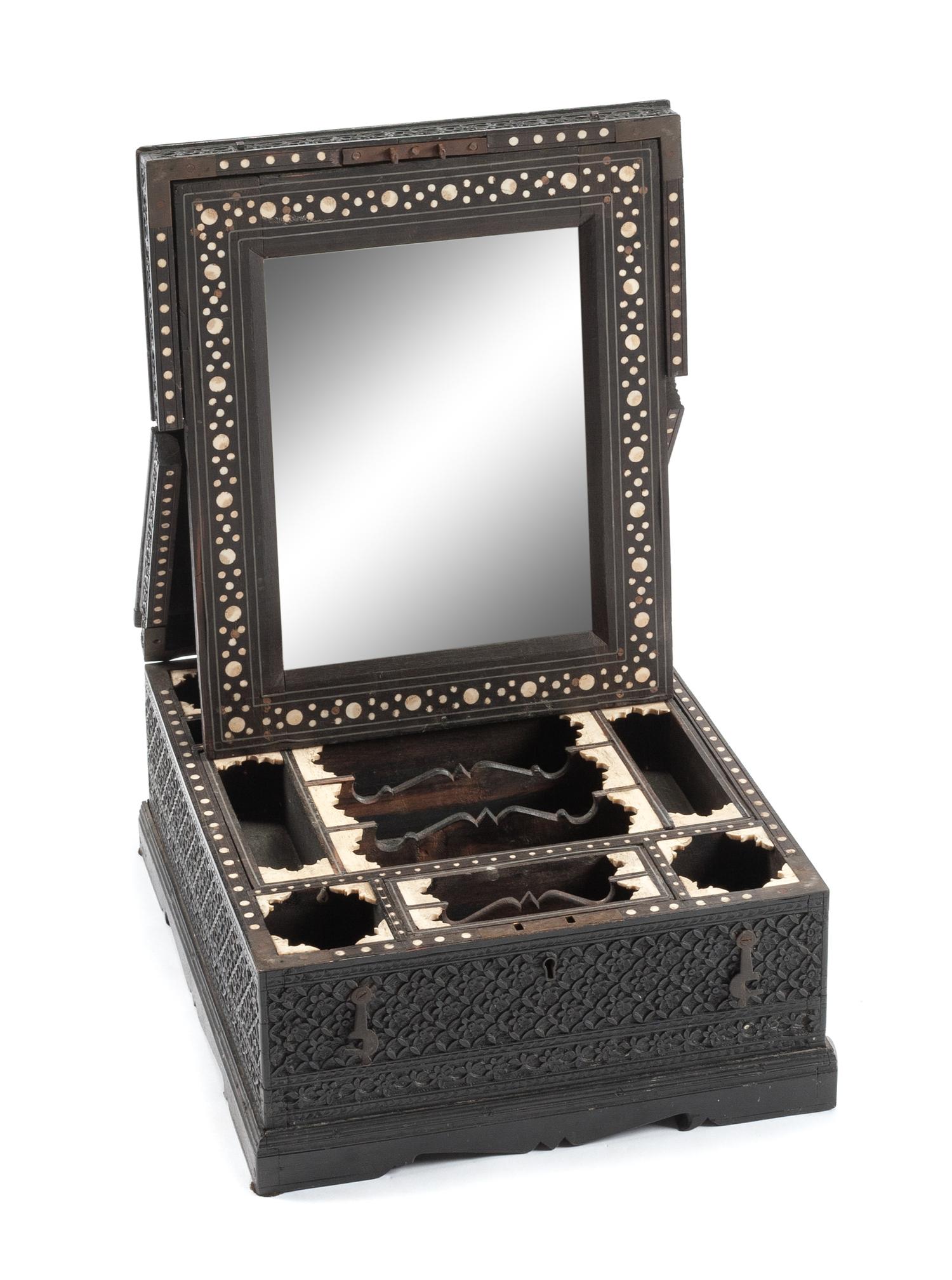 An Indian Carved Dressing Box Height 5 1/2 x width 12 3/4 x depth 11 3/4 inches. — LATE 19TH/EARLY 20TH CENTURY