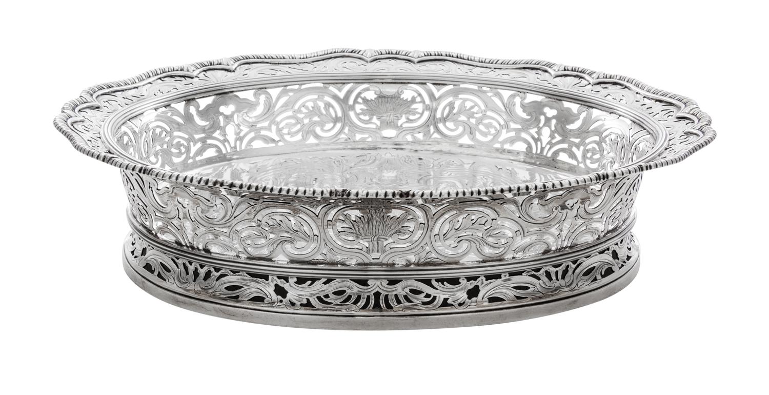 An English Silver Center Bowl, Paul Crespin, London, 1744, of oval, reticulated form with a gadrooned rim over the pierced foliate side