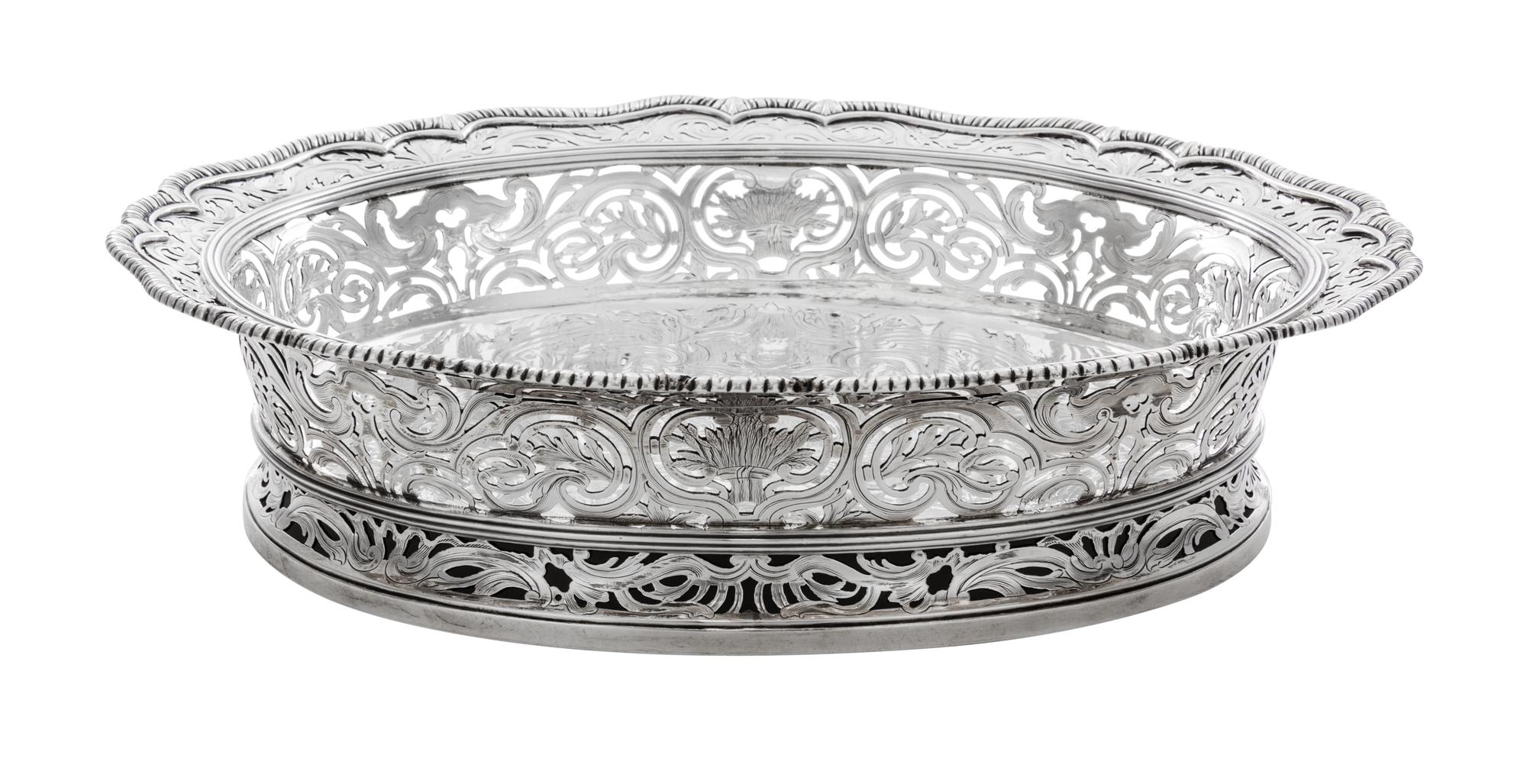 An English Silver Center Bowl, Paul Crespin, London, 1744, of oval, reticulated form with a gadrooned rim over the pierced foliate side
