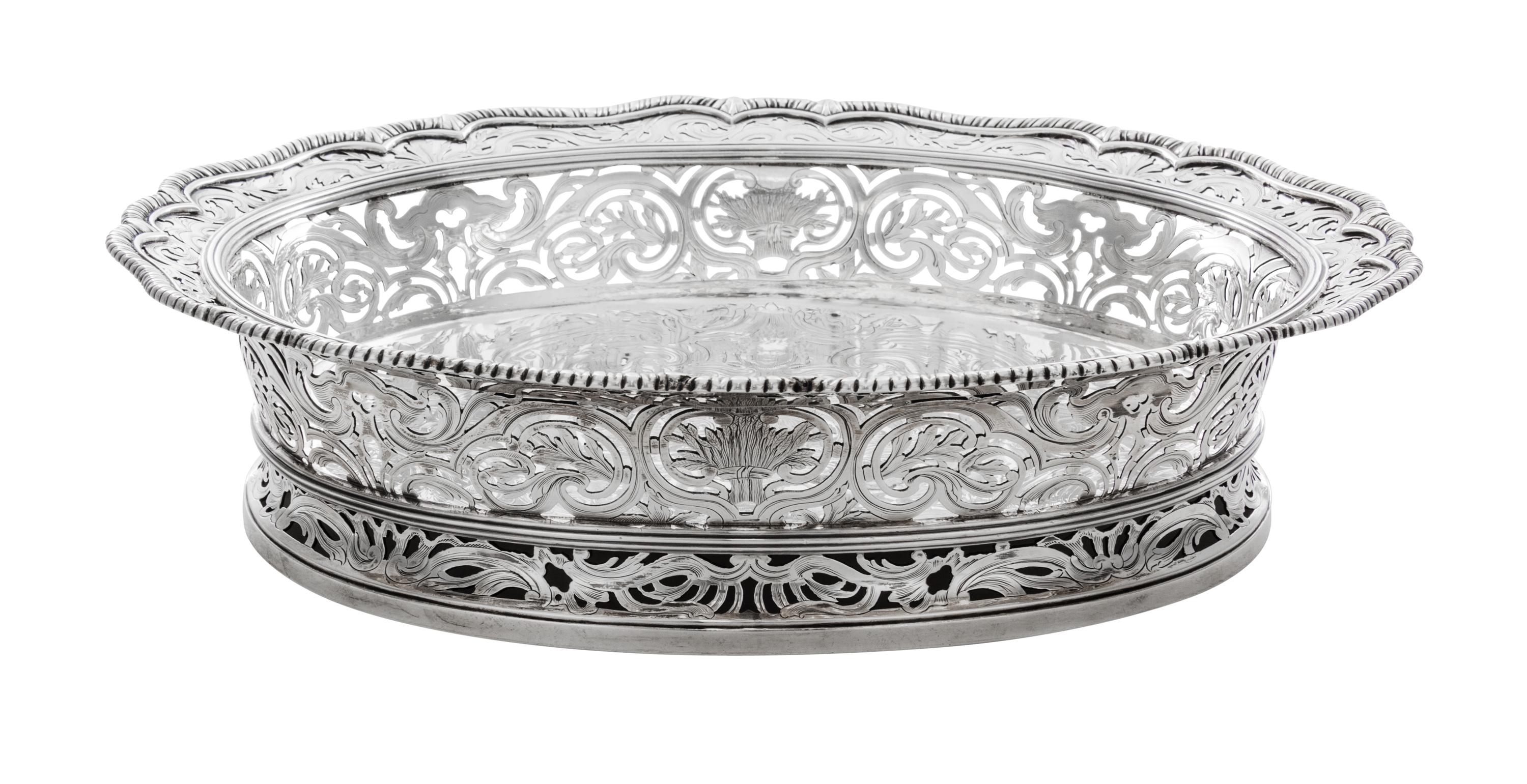 An English Silver Center Bowl, Paul Crespin, London, 1744, of oval, reticulated form with a gadrooned rim over the pierced foliate side