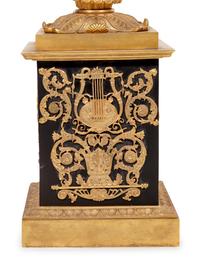 A Pair of Empire Style Gilt and Patinated Cast Metal Seven-Light Torchères
