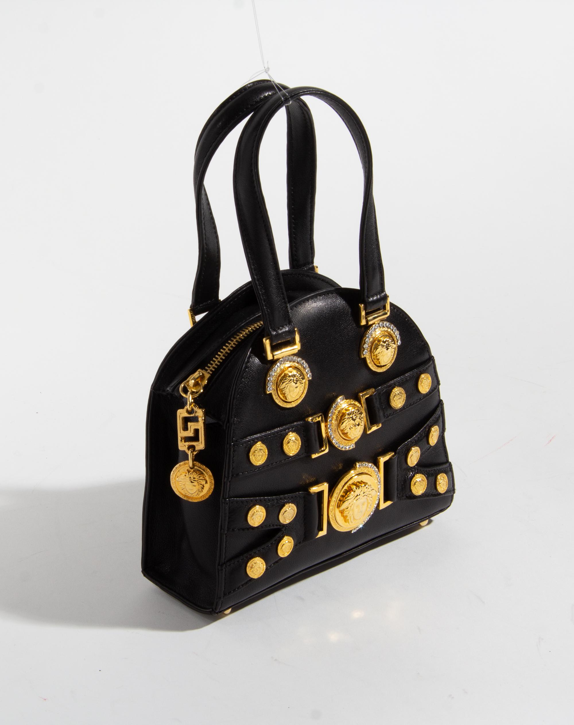 A Gianni Versace Black Mini Medusa Bag, 6" x 6.75" x 2.75"; Handle drop: 4".