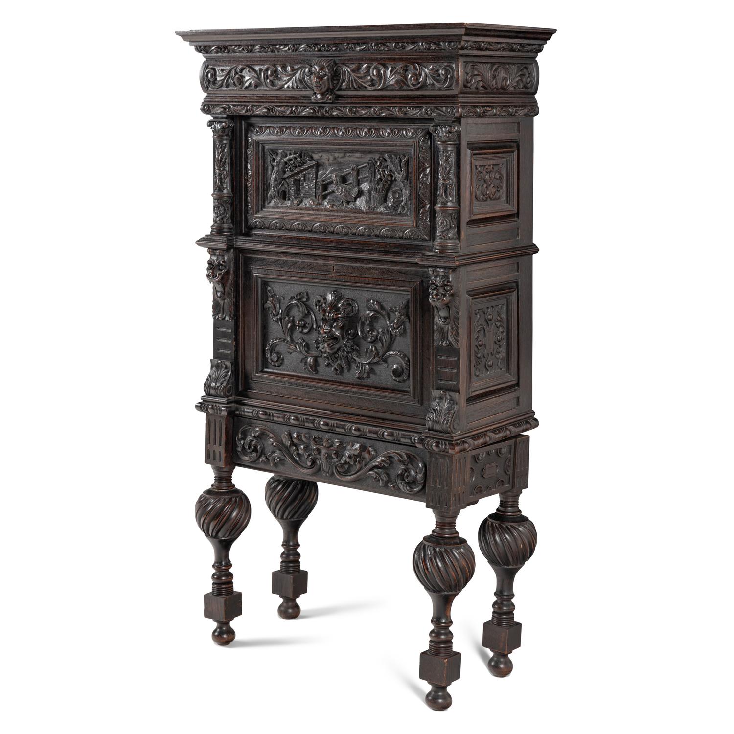 An Italian Renaissance Revival Carved Oak Bureau Cabinet on Stand