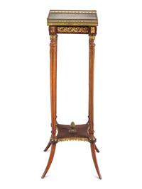 A Louis XVI Style Gilt Metal Mounted Onyx-Top Pedestal Table