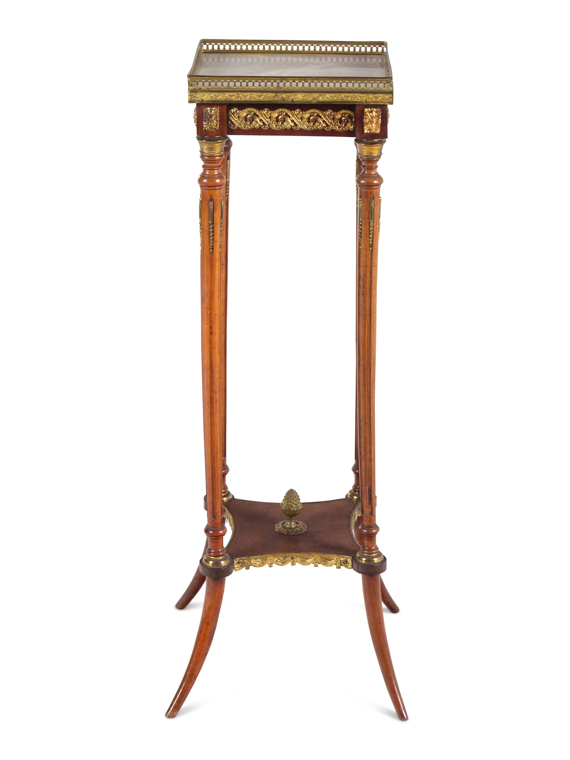 A Louis XVI Style Gilt Metal Mounted Onyx-Top Pedestal Table