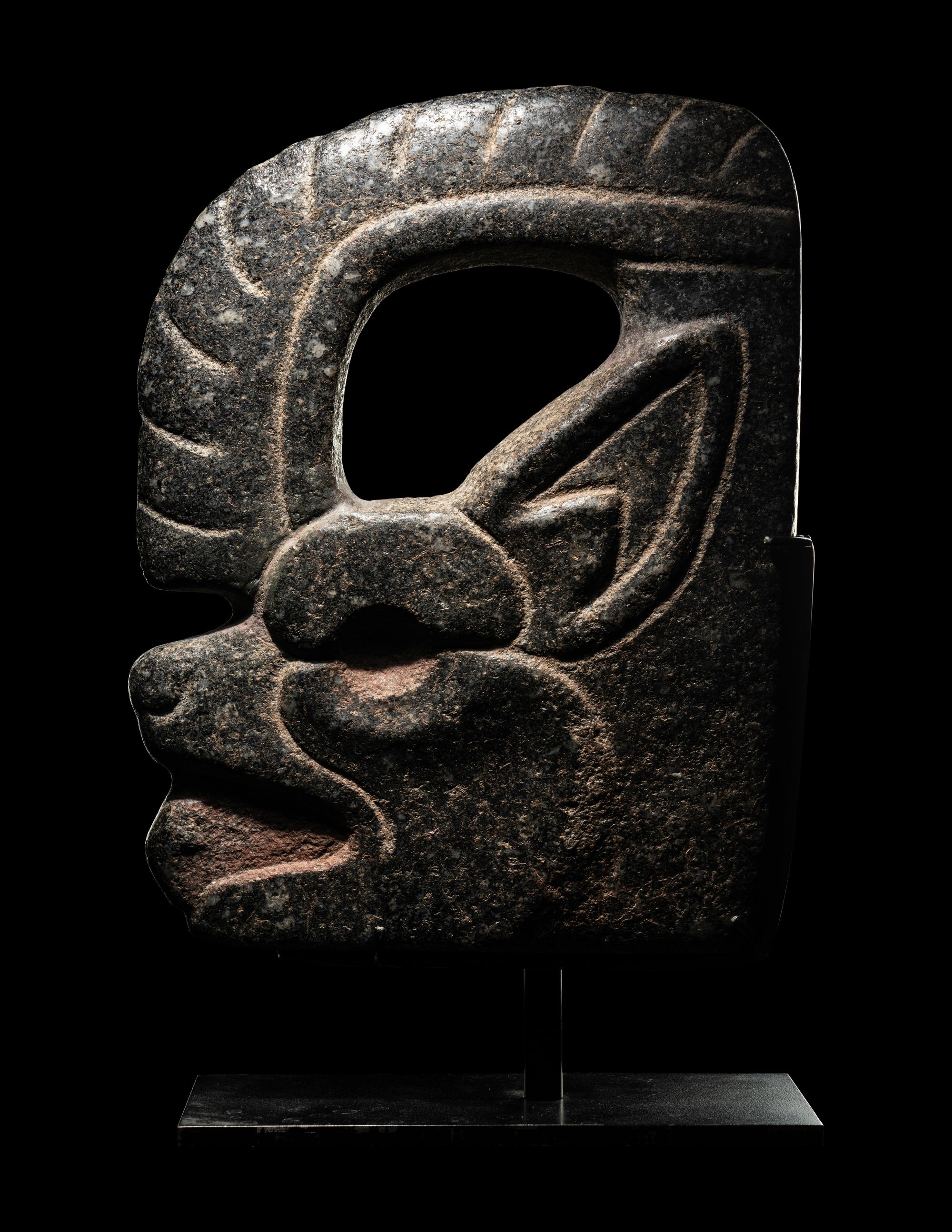 A Maya Stone Hacha in the Form of a Jaguar or Bat