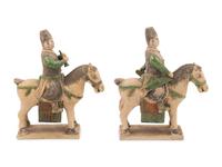 A Pair of Chinese Sancai Glazed Mounted Musician Burial Figures