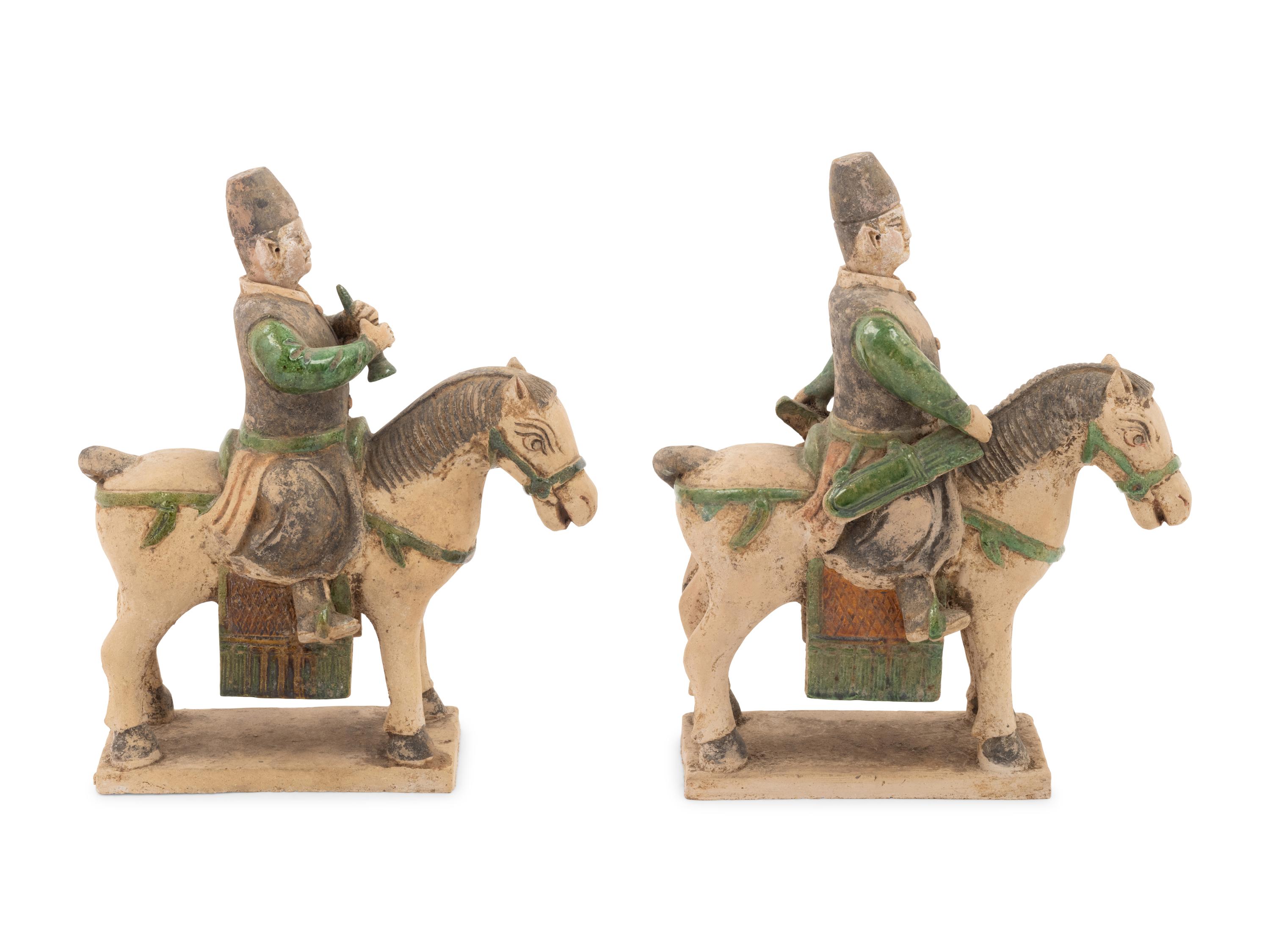 A Pair of Chinese Sancai Glazed Mounted Musician Burial Figures