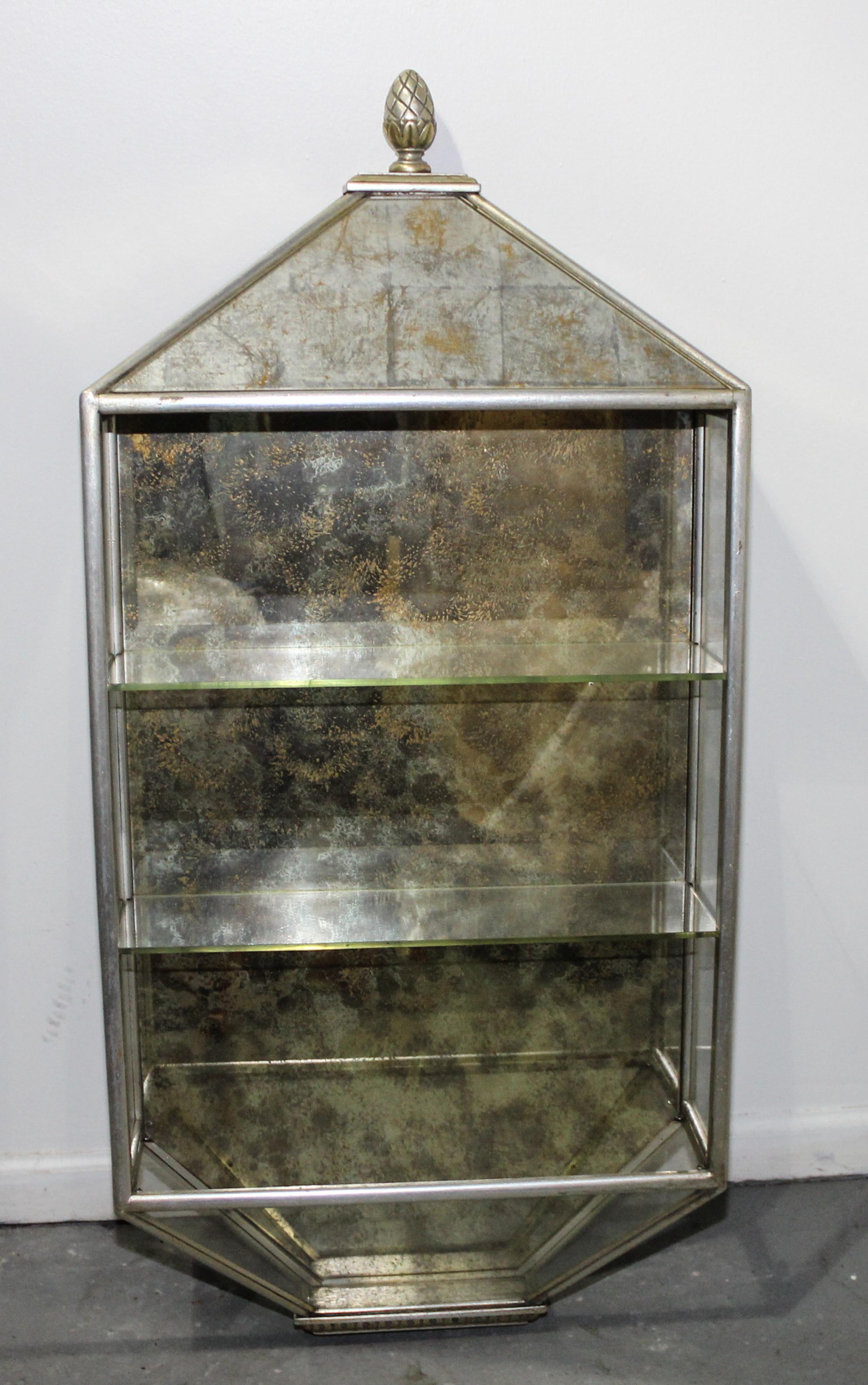 A Silvered and Gilt Decorated Hanging Vitrine Height 43 x width 21 x depth 6 3/4 inches. — MID TO LATE 20TH CENTURY