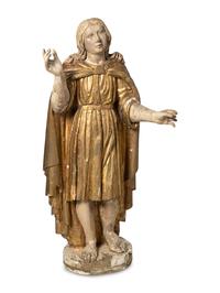 A Continental Painted and Parcel Giltwood Figure