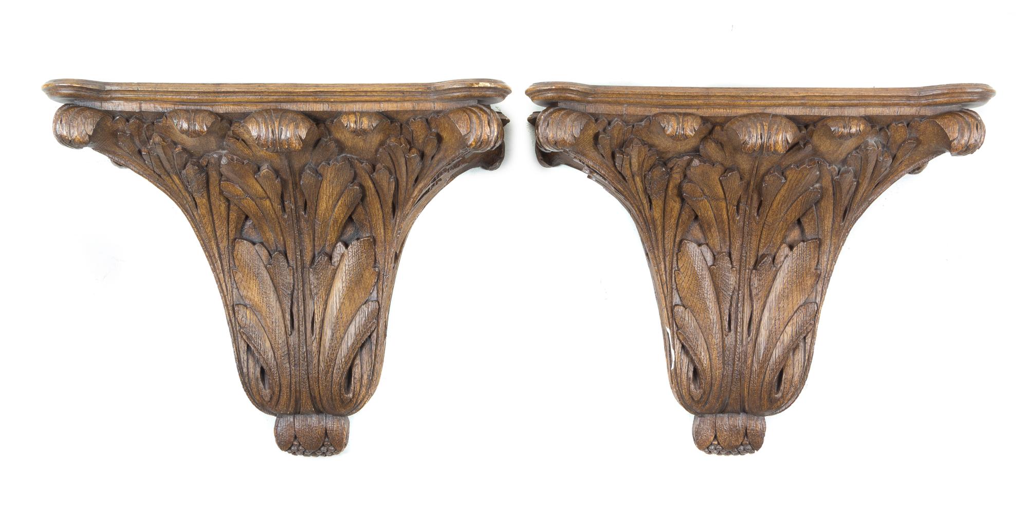 A Pair of Carved Oak Wall Brackets Height 15 5/8 inches. — 20TH CENTURY