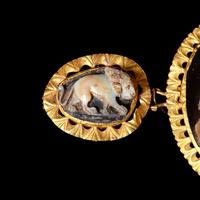 A Trio of Gold-mounted Sardonyx Cameos featuring Nero