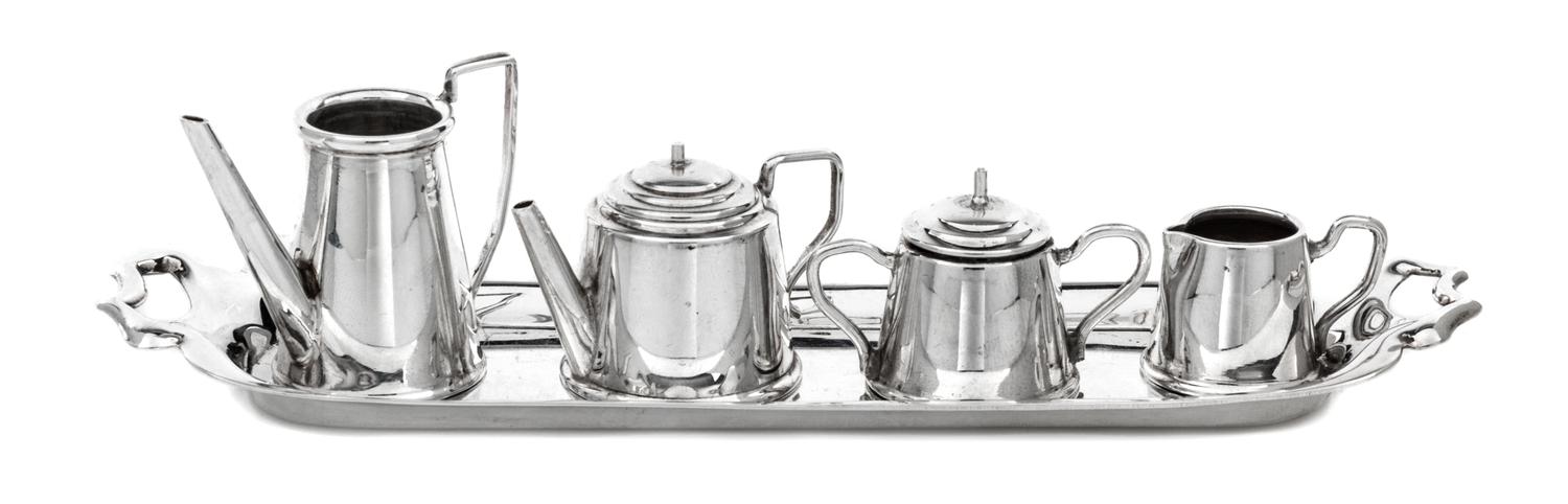 An English Silver Four-Piece Tea Service, A. Marston & Co., Birmingham, 1986 and others, comprising a teapot, a coffee pot, a covered s
