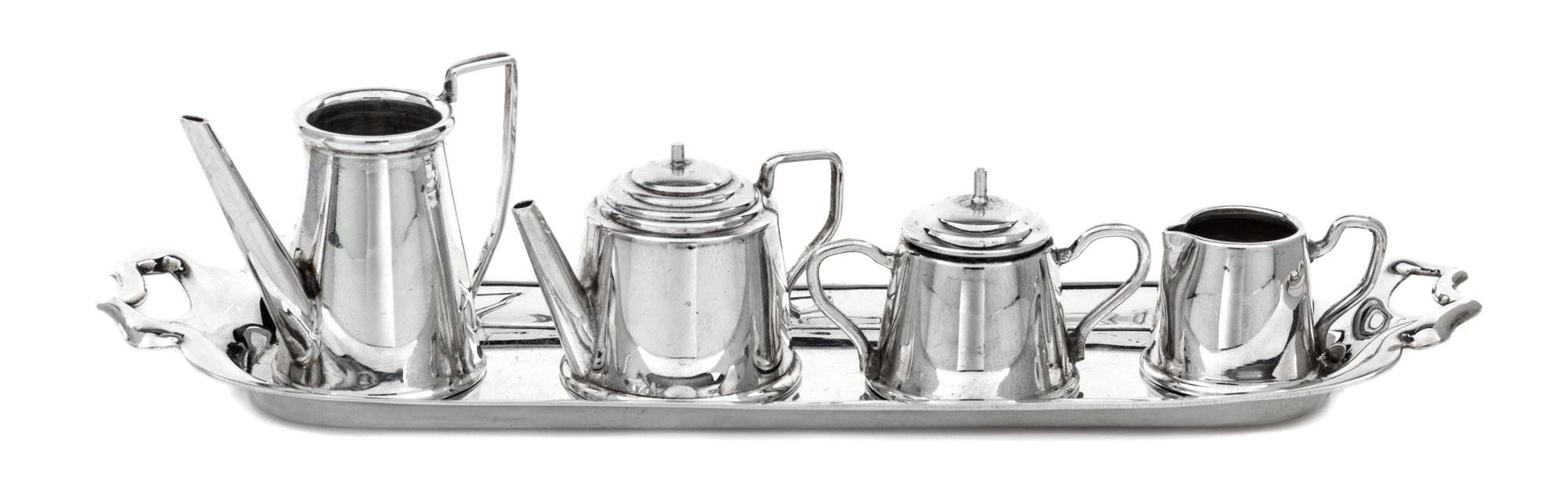 An English Silver Four-Piece Tea Service, A. Marston & Co., Birmingham, 1986 and others, comprising a teapot, a coffee pot, a covered s