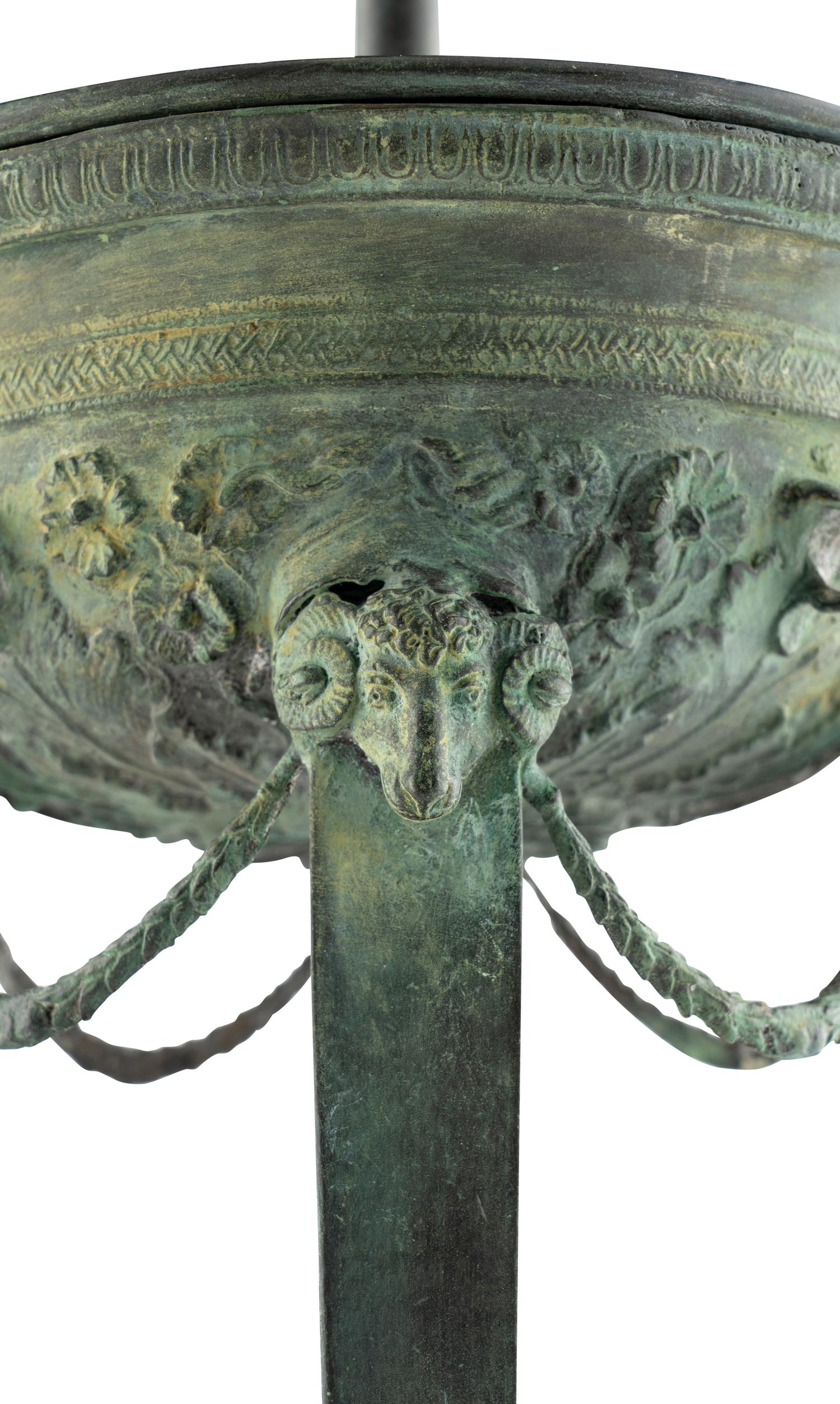 A Pair of Patinated Cast Metal Athéniennes Mounted as Lamps