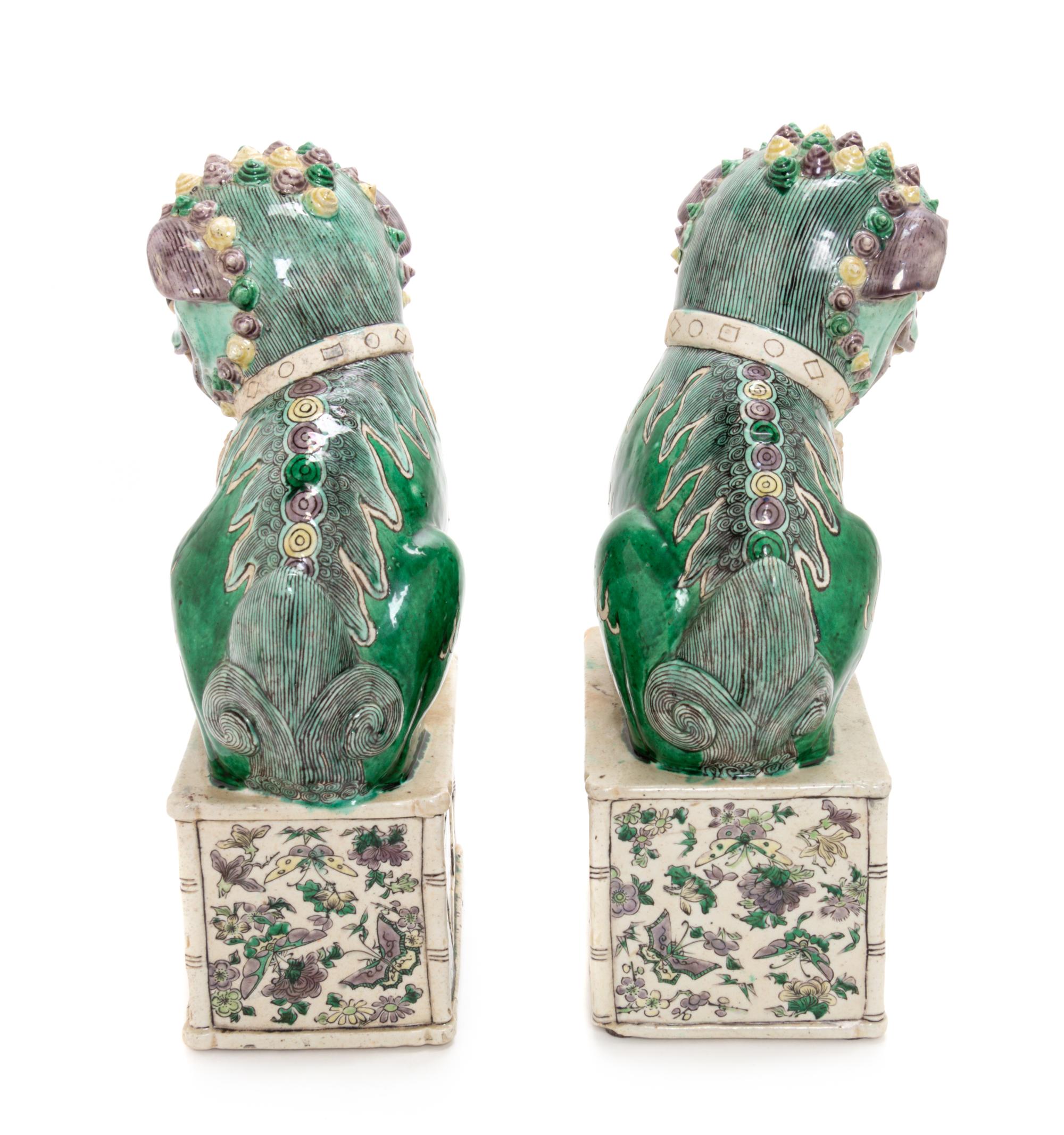 A Pair of Famille Verte Porcelain Figures of Fu Lions