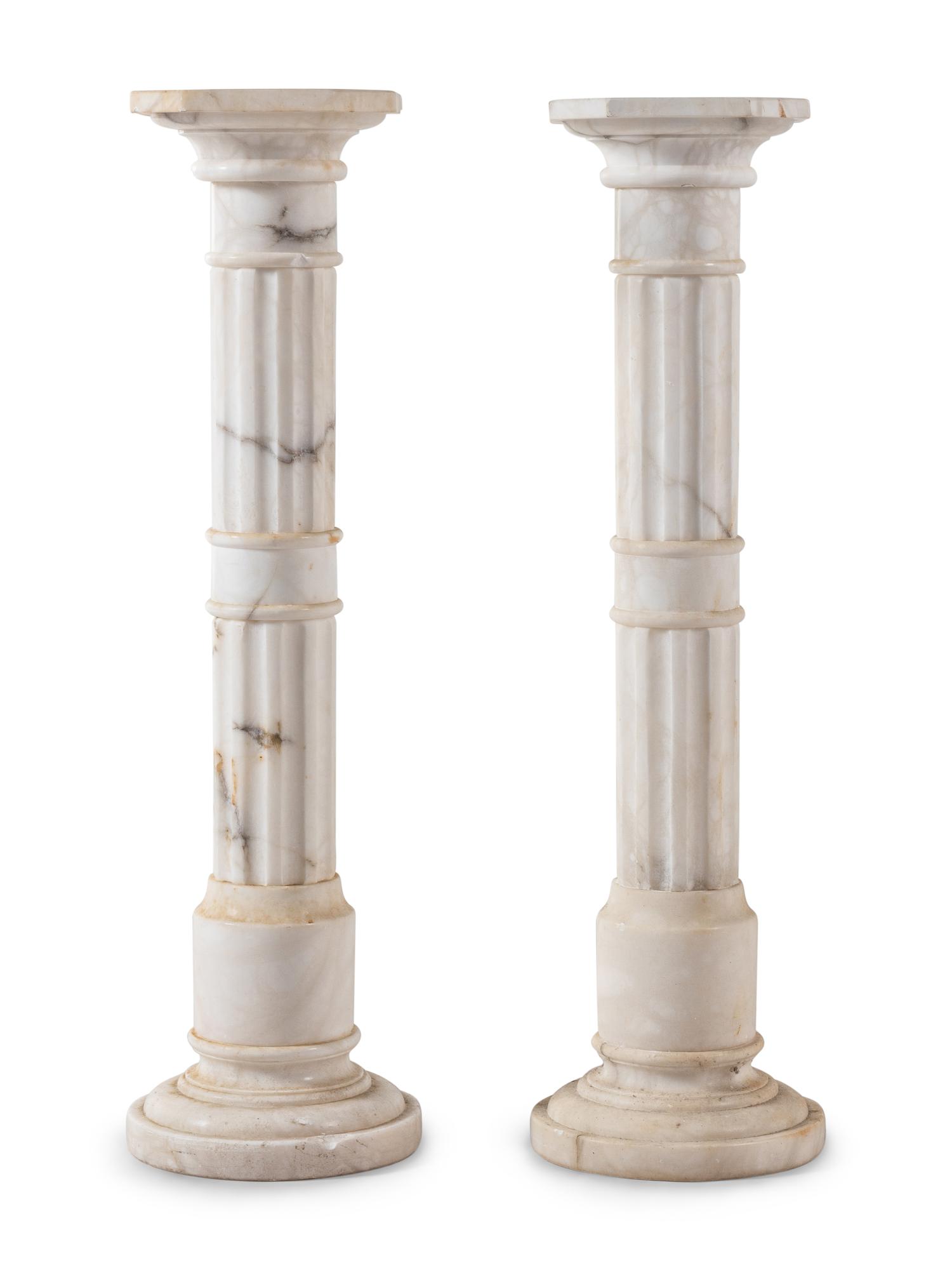 A Pair of Continental Marble Pedestals