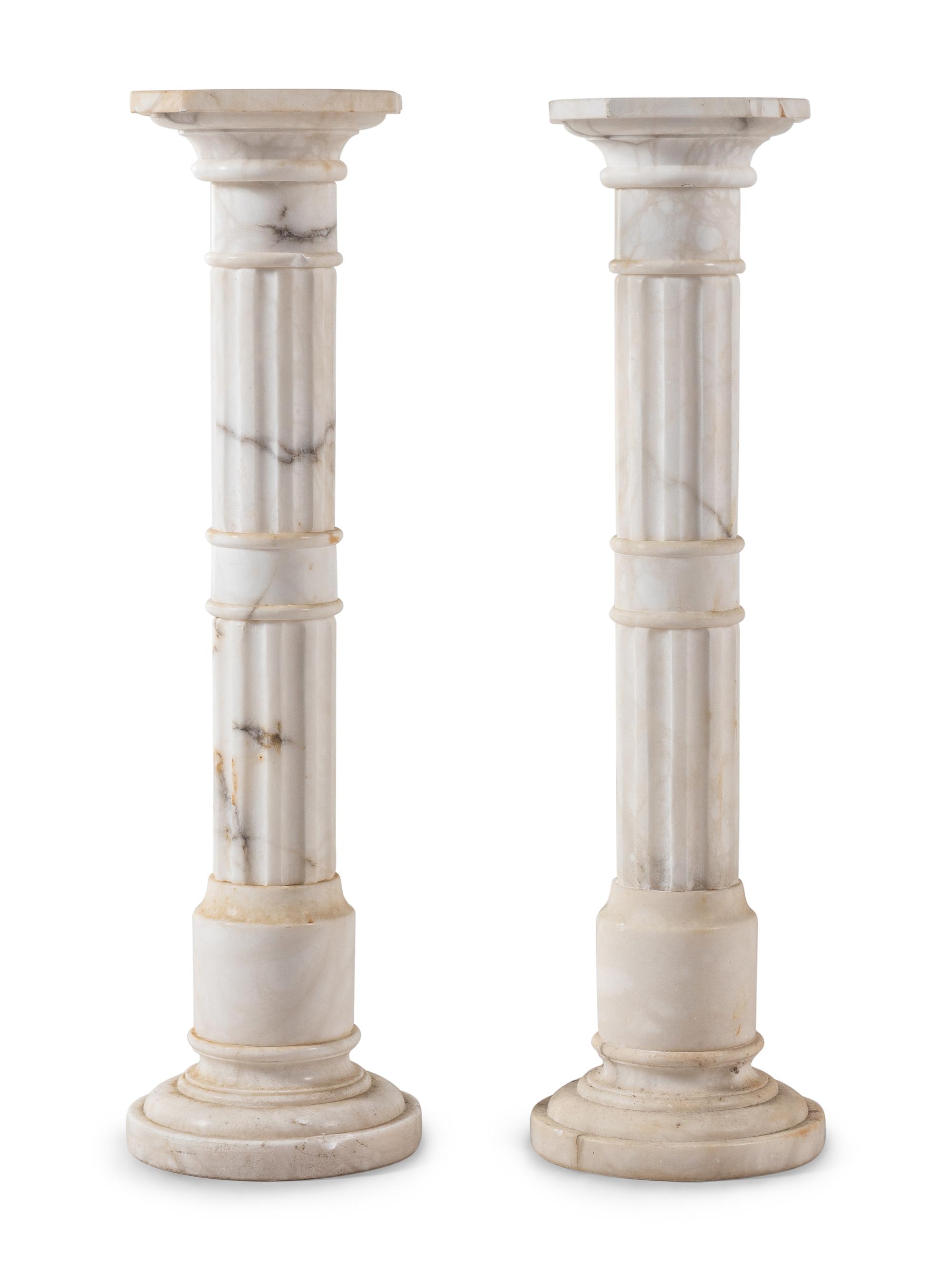 A Pair of Continental Marble Pedestals