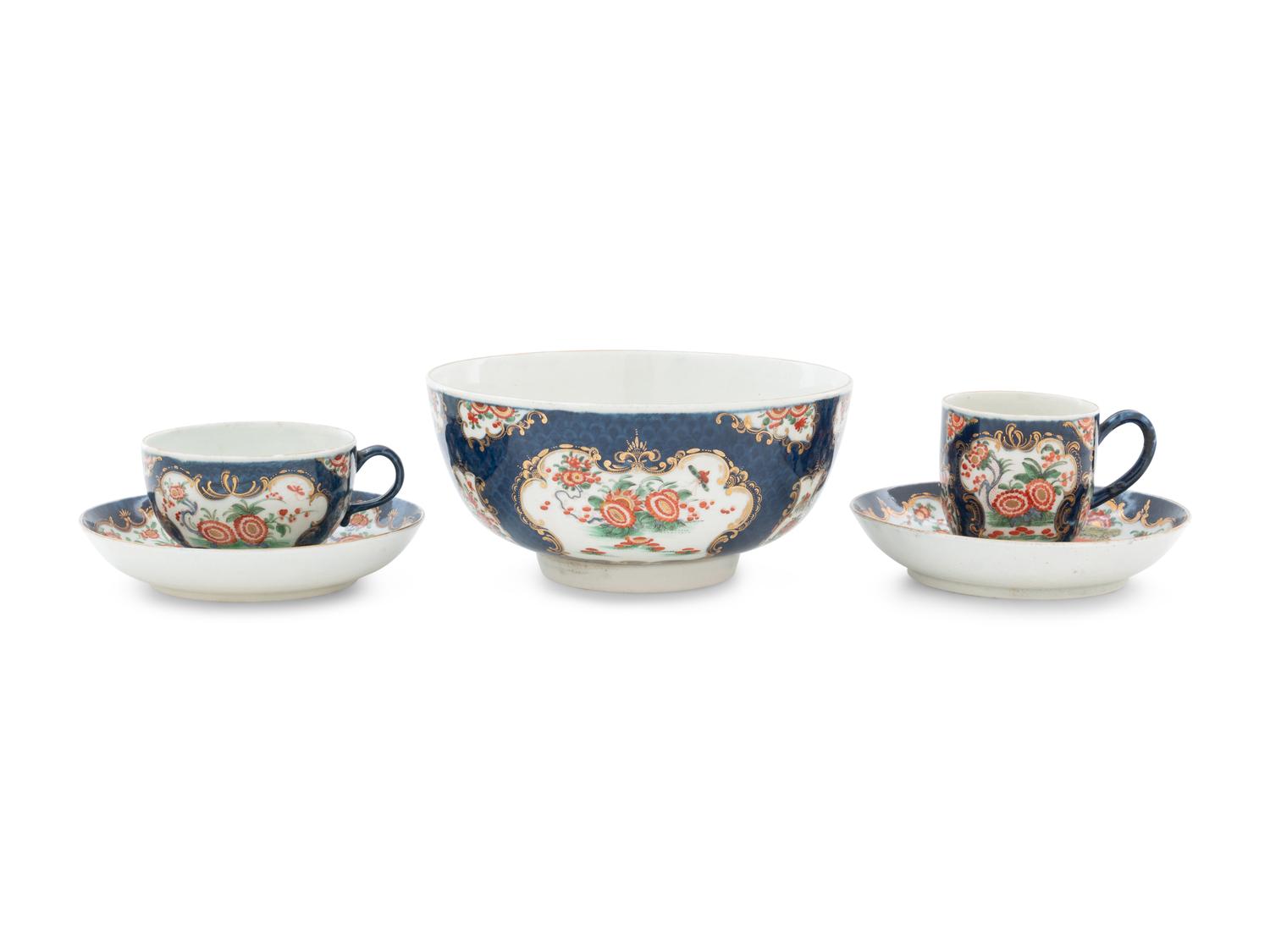 A Royal Worcester Painted and Parcel Gilt Porcelain Tea and Coffee Service