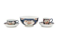 A Royal Worcester Painted and Parcel Gilt Porcelain Tea and Coffee Service