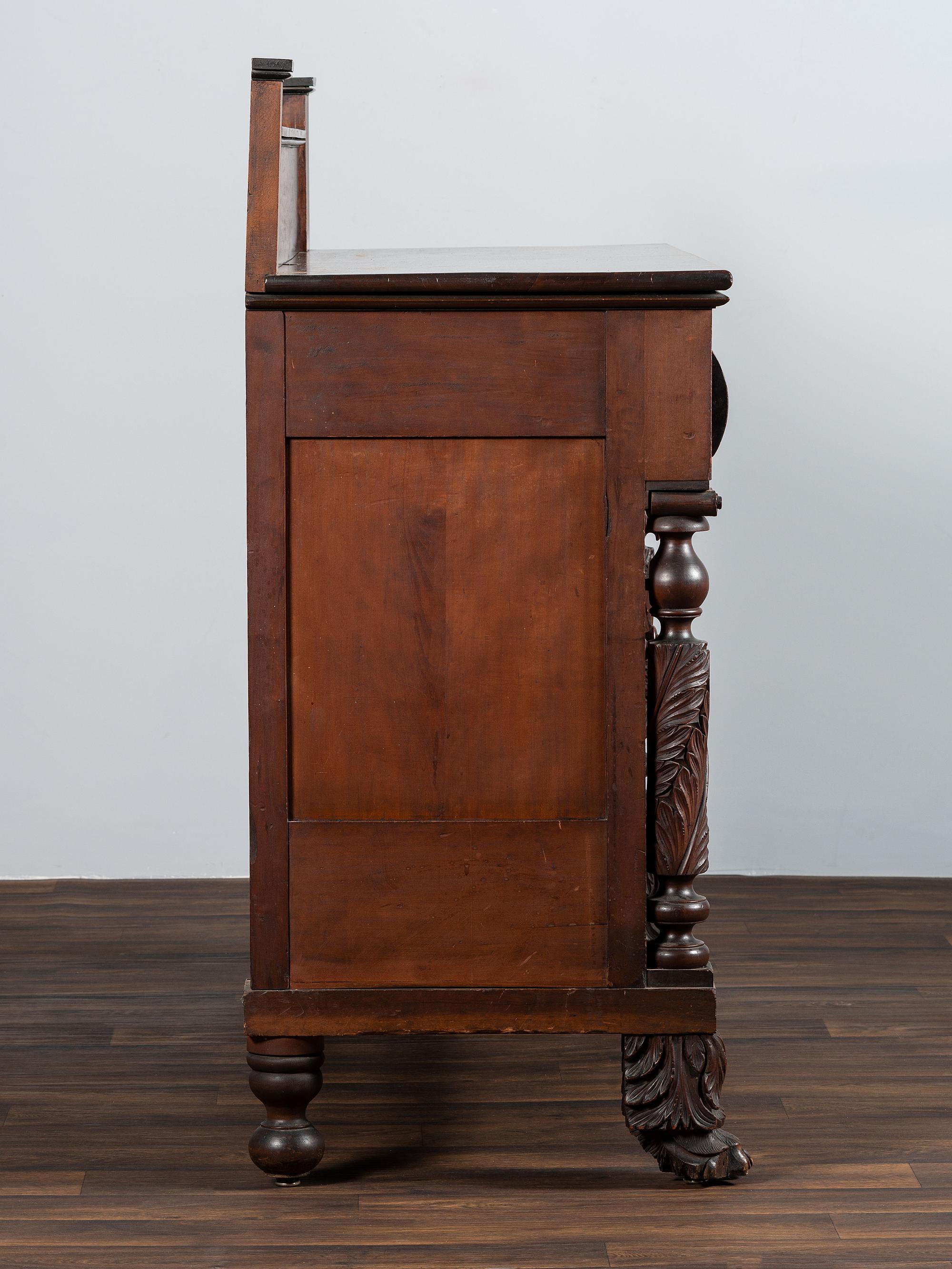 AWAITING DONATION - A Classical Carved and Stained Cherrywood Sideboard