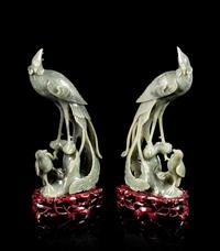 A Pair of Spinach Jade Figures of Pheasants Height of each 11 inches. — 20TH CENTURY