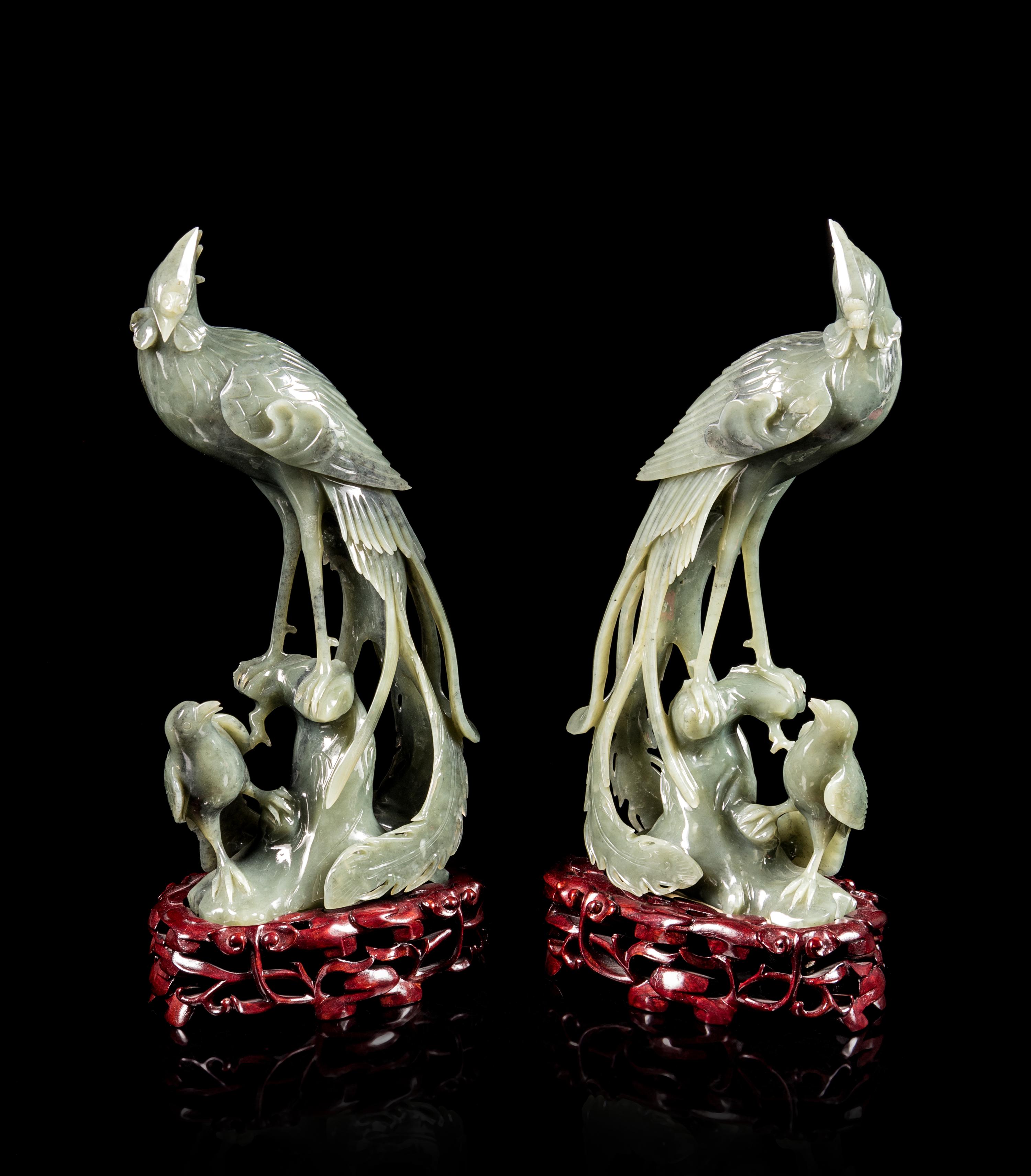 A Pair of Spinach Jade Figures of Pheasants Height of each 11 inches. — 20TH CENTURY