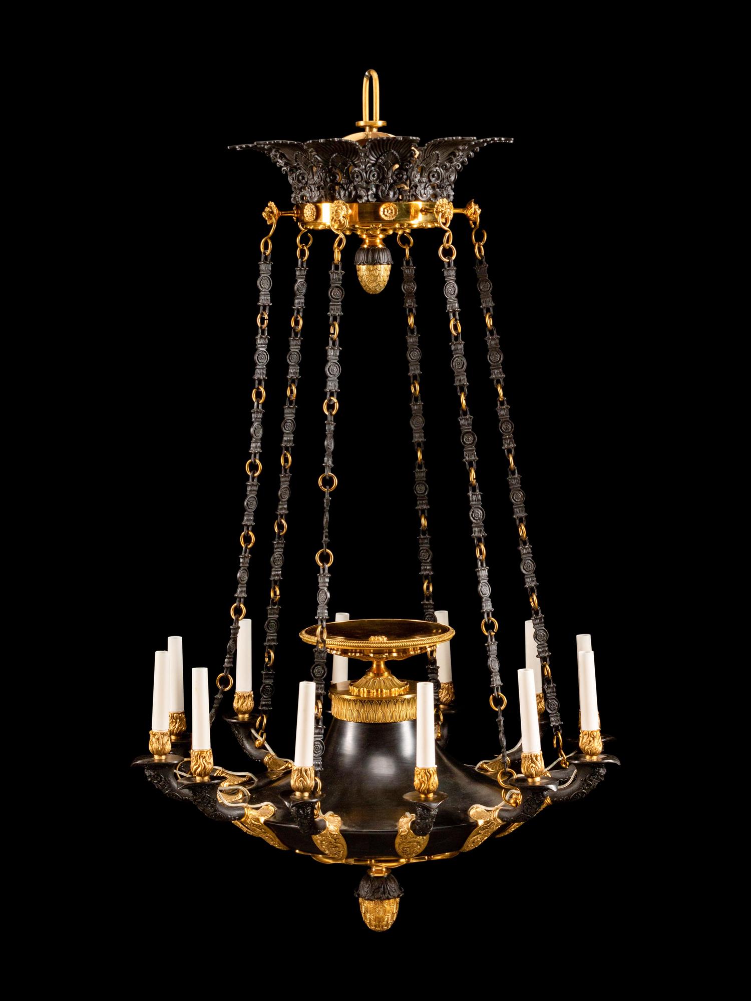 An Empire Style Gilt and Painted Metal Twelve-Light Chandelier